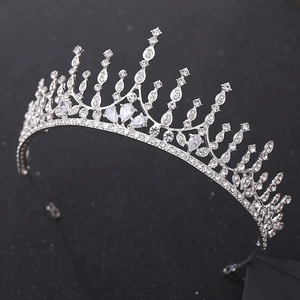 Elegant silver bridal crown with geometric zircons and pear-shaped stones for weddings