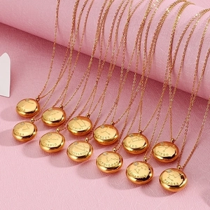 Golden zodiac coin necklaces with stainless steel chain featuring engraved star signs