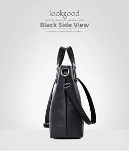 Seitenansicht der schwarzen matten Ledertasche mit Silberbeschlägen und Trageriemen