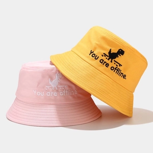 Close-up of pixel dinosaur embroidery and 'You are offline' text on high-quality cotton bucket hats