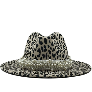 Classic leopard print fedora hat featuring a white pearl beaded band on wide brim wool felt