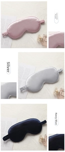 Detail view of satin sleep masks in taro purple, silver, and navy with elastic straps