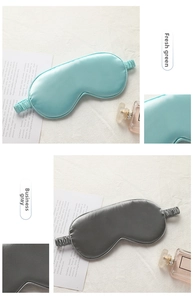 Detailed view of silk sleep masks in fresh green and business grey with elastic bands