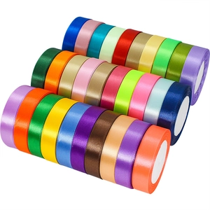 Rolls of 2cm colorful satin ribbons for gift wrapping and wedding cake decorations