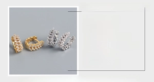 Detailed view of S925 sterling silver wheat ear huggie earrings with cubic zirconia stones