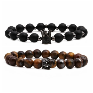 Tiger eye stone and matte black beaded crown bracelets for couples on white background
