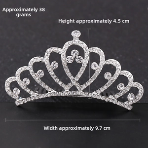 Detailed view of silver crystal tiara showing 4.5cm height and 9.7cm width dimensions