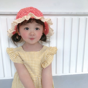 Pink straw sun hat for toddlers featuring elegant beige lace trim and chin strap
