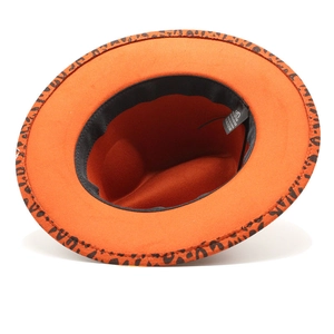 Orange wide brim fedora hat featuring leopard print lining and inner wash label