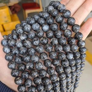 Natural dark grey Larvikite round beads strand with shimmering mineral texture