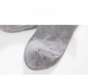 Detail of grey low cut sock showing smooth toe seam and premium knit texture