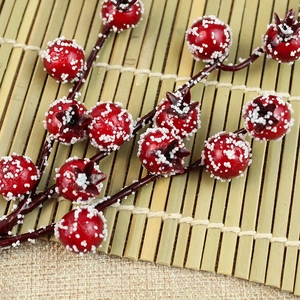 Artificial Christmas red berry branch with snow effect for holiday tree decoration