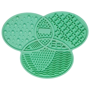 Tappetino in silicone verde menta per pulizia pennelli trucco con ventosa e texture