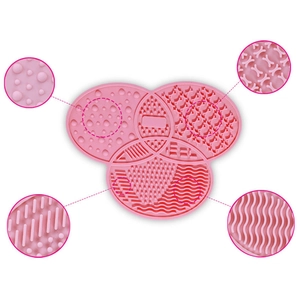 Tappetino in silicone rosa per pulizia pennelli trucco con ventose e diverse texture