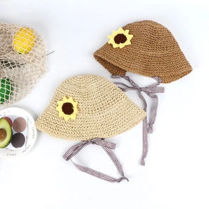 Straw sun hats for girls featuring crochet sunflowers and stylish checkered ribbons