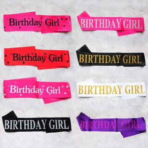 Detailed collection of assorted colorful glitter birthday girl satin sashes displayed neatly