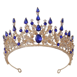 Detailed view of baroque bridal crown with blue gemstones and white zircons
