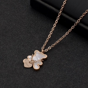 Collier en acier titane or rose 18K avec pendentif ours blanc et breloque coeur Love