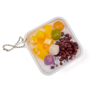 Cute PVC dessert keychain with fake mango, taro balls and beans in a white bowl
