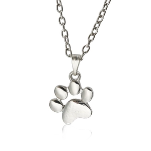 Cute silver cat paw pendant necklace with a polished finish on a clean white background