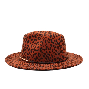 Detail of leopard print wool fedora hat with black leather belt and gold hardware
