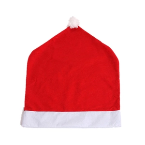 Red non-woven Christmas hat chair covers with white pom-pom for holiday table decoration