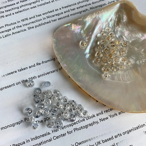 925 silver earring backs with clear silicone sleeves shown in a group over a clean background