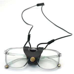Faux leather braided eyewear lanyard with bronze hardware and clear frame glasses