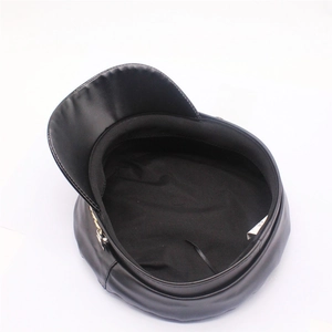 Black PU leather baker boy hat with metal chain detail and size 58 label inside
