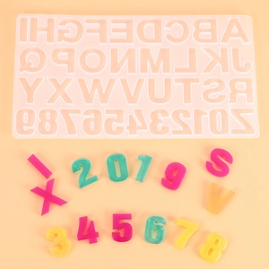 DIY silicone mold for epoxy resin featuring alphabet A-Z and 0-9 digits with colorful samples