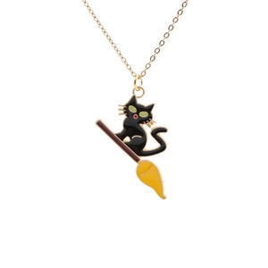 Fashionable black cat on a broomstick necklace with gold chain for Halloween accessories