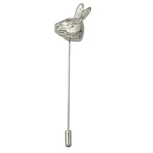 Detailed view of silver rabbit lapel pin with textured relief and metal protector cap