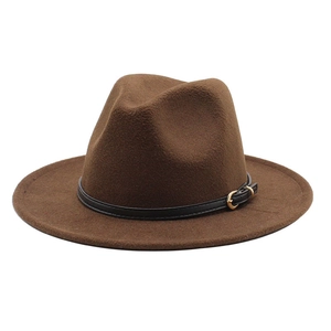 Detail of a brown wool fedora hat featuring a black leather band and golden metal buckle