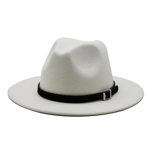 Detail of white wool jazz hat with a black leather belt and silver metal buckle