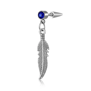 Macro view of feather earring with blue gemstone and silver metal tassel chains