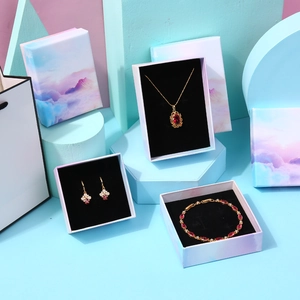 Blue gradient jewelry box set with matching necklace, earring case and gift bag