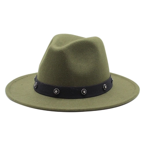 Close-up of olive green wool felt fedora featuring a black band with floral metal studs