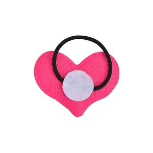 Close-up of a cute pink heart-shaped hair tie with a black elastic band on white background