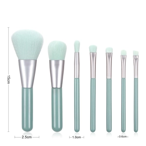 Detailed view showing sizes for 7-piece green makeup brush set with silver ferrules