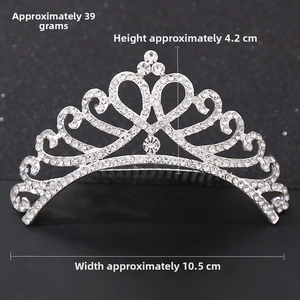 Silver crown hair comb with clear rhinestones measuring 10.5cm wide and 4.2cm high
