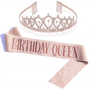 Close-up of rose gold rhinestone tiara and sparkling Birthday Queen sash for party