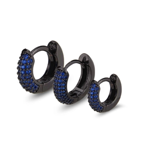Three sizes of black hoop earrings with pave-set deep blue zirconias on white background