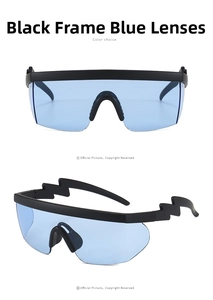 Detail view of sport sunglasses with lightning bolt temples and blue tinted lenses