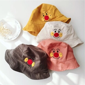 Detailed shot of multi-color cotton sun hats with cute cartoon embroidery for kids