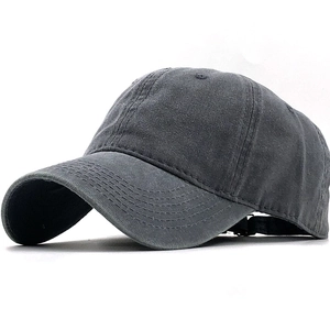 Detailed side view of washed cotton baseball cap in dark gray with adjustable back strap