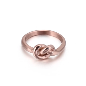 Elegant rose gold knot ring for women featuring a minimalist polished metal design