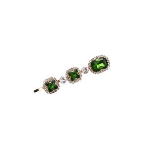 Vintage gold hair clip with emerald green crystals and sparkling white zircons