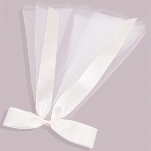 Short white bridal veil with layered mesh tulle and a decorative silk bow accent