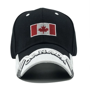 Detail of embroidered Canada flag and white 3D letter text on black baseball cap brim