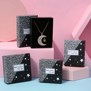 Star-themed pink and blue jewelry gift boxes with silver glitter and star patterns